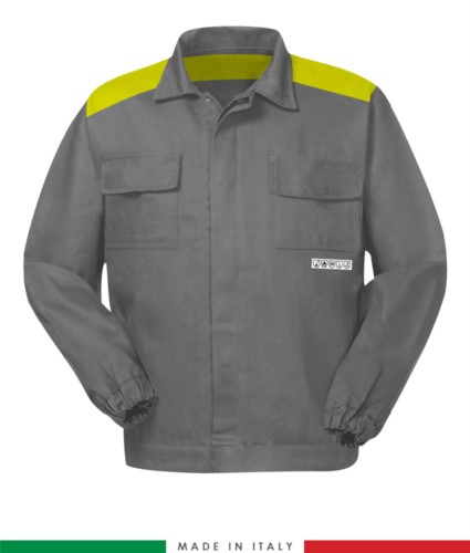 Multipro two-tone jacket, covered button closure, two chest pockets, elasticated cuffs, colour inserts on shoulders and inside collar, colour grey/yellow