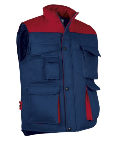 Polyester and cotton multi-pocket work vest, polyester padding. Navy blue / red colour