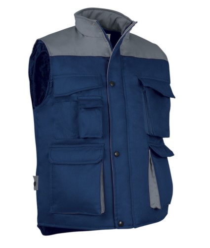 Polyester and cotton multi-pocket work vest, polyester padding. Navy blue / grey colour