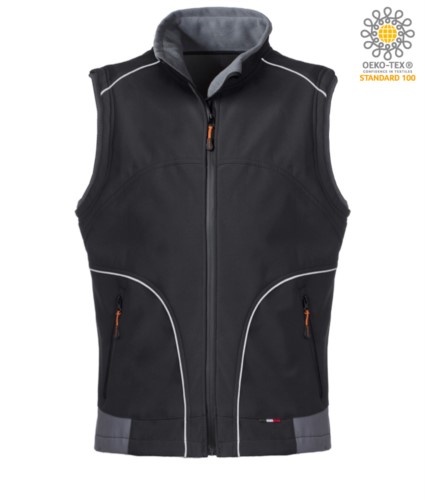 Black softshell work vest with reflective inserts. Polyester fabric.