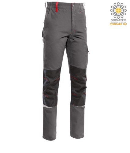 Two tone multi pocket trousers, refractive piping below the knee. Color grey/red