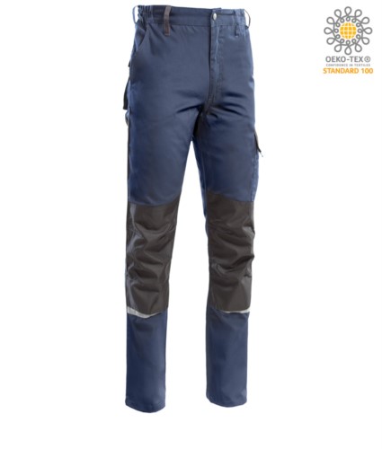 Two tone multi pocket trousers, refractive piping below the knee. Color blue/grey