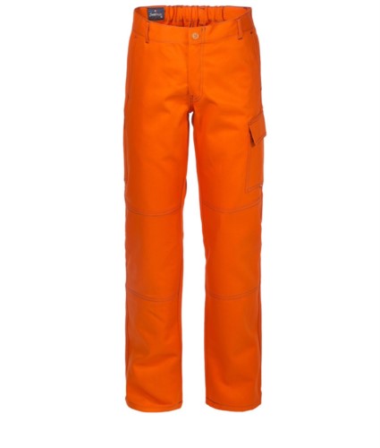 Multi pocket trousers 100% Cotton, contrasting stitching. Color: orange